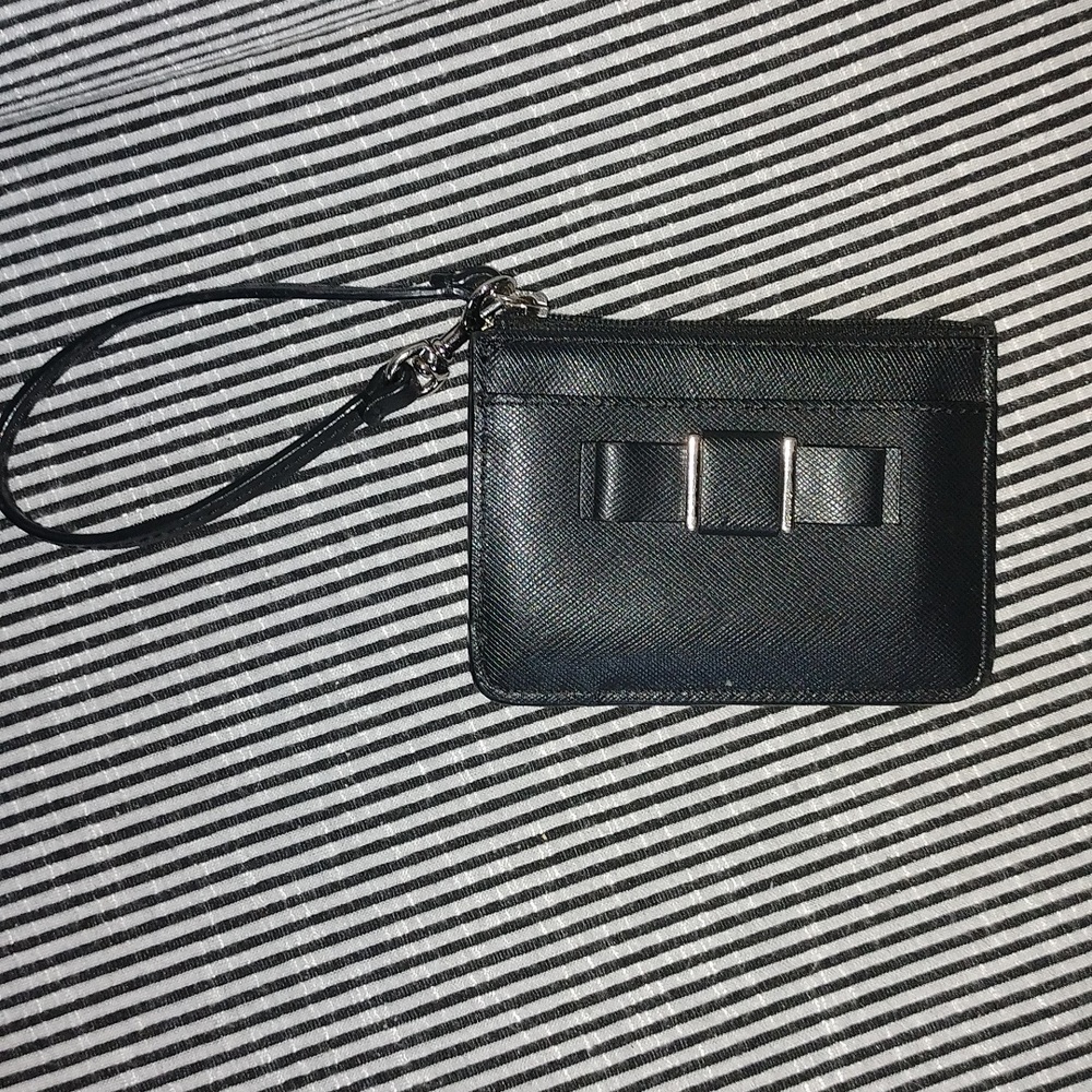 Coach black saffiano leather card holder/key holder.